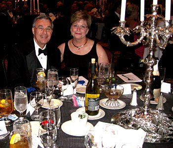 Bill and Ginny Morrow at at elegantly decorated table