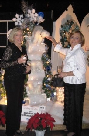 WVLT's Shirley Nash-Pitts, right, admires a Christmas tree with her friend, Glenda Gideon