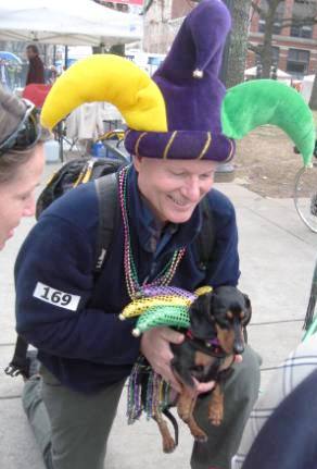 Some humans and dogs dressed to match