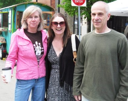 lisaandlyonses Lisa Duncan, left, is executive director of the Dogwood Arts Festival. She stopped to chat Saturday morning with Gay and Bill Lyons in the middle of Market Street, which was closed for the day's festivities.