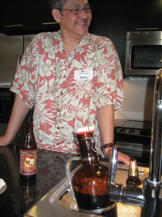 bill-marks-growler-of-porter Bill Marks serves from a growler of porter, in foreground.