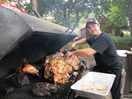 Sweet P's owner Chris Ford picks the pigs Saturday.