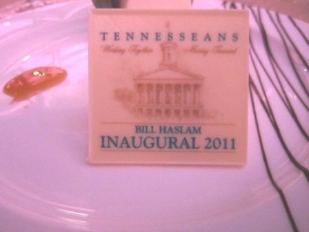 chocolate This piece of white chocolate had the inauguration's theme on it: "Tennesseans working together; moving forward."