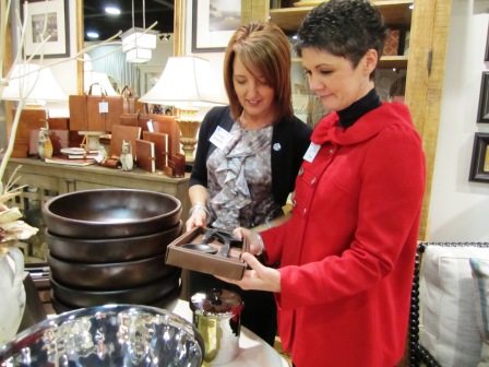 sherry-lorie Sherry McHaffie, left, and Lorie Jaynes consider a purchase.