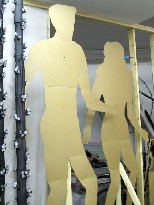 figures These huge patterns, cut out in cardboard, will be cast in gold tones for the final installation. So will the moon in the top photo.