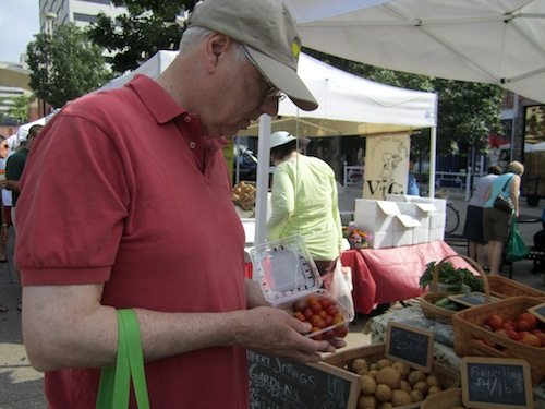 alan-selects-tomatoes Heirloom cherry tomatoes would make a good -- an unique -- addition to our tuna appetizer.