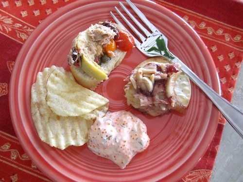 appetizers Tuna Le Dauphin, top, baked brie, right, and caviar dip which is great with gourmet potato chips. The linens came from an open market in Provence. It was fun using them!