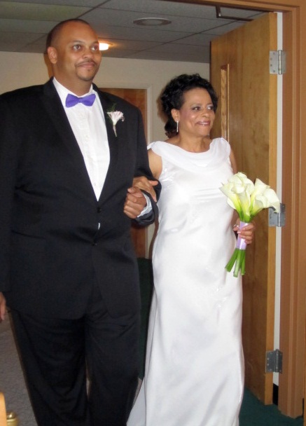 The bride was excorted down the aisle by her son, Jason Kelso Cloud.