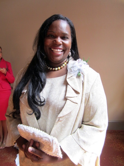Lisa M. McClain played the piano and sang at the wedding ceremony. She was great.