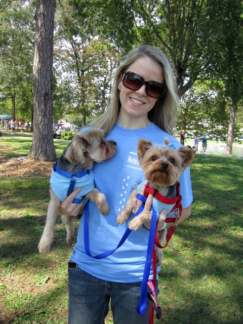 Moxley Carmichael graphic designer Erica Beck with Bentley, left, and Maya. Erica designed our great t-shirts -- for humans and dogs!