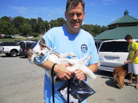 This little guy was tired. Shawn Ballard holds Miguel.