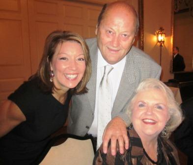 sharon-and-fords Between courses, Sharon Donnell of Pilot Flying J, left, popped over to our table to visit with Richard and Dawn Ford.
