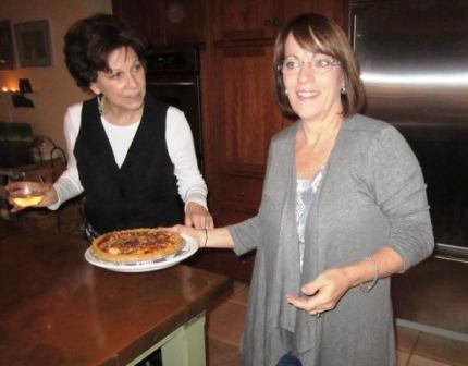 Class member Annette Winston brings a contribution to the dessert bar. Actually, she brought two pies!
