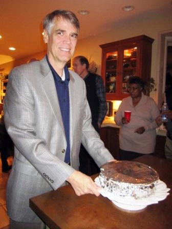 Federal Judge Tom Varlan, a member of the Leadership Knoxville Class of '93, brings in his wife, Danni's, homemade cheesecake to our class party earlier this month.