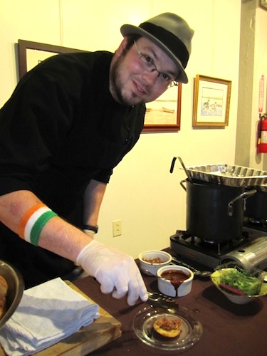 alligator Chef Jeffrey Alejandro of The Crown & Goose preparing braised alligator tostados with Tagalong mole sauce. Based on Tagalong cookies, of course!