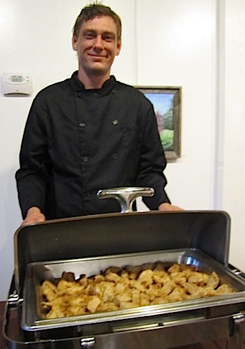 jesse-and-chicken Chef Jesse Hood of Knoxville Catering and Special Events with the chicken breaded with Savanah Smiles lemon cookies, which took the prize for best savory dish.