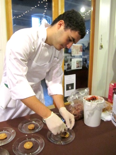 plating-duck Chef Austin Wood of Echo plates smoked duck breast confit with cranberry compote and creme fraiche. His dish made use of Thank You Berry Much Girl Scout cookies.