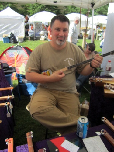 canjo-man Jared Weaver of Lenoir City, Tenn., calls himself the Canjo Man. Here he demonstrates his canjo playing! They are one-string instruments made of old cans!