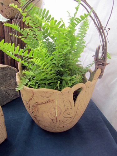 clay-basket These beautiful stoneware baskets were drawing a crowd yesterday to the booth of Mary Curtin of Briston, Tenn.