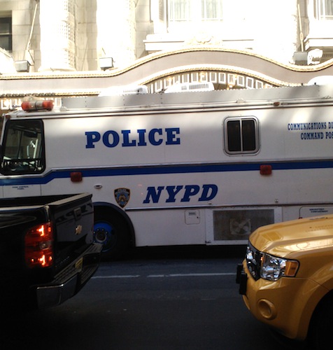 cops This is the NYPD communications command center that was moved in. A few blocks away were dozens of police cars and other emergency vehicles with flashing lights.