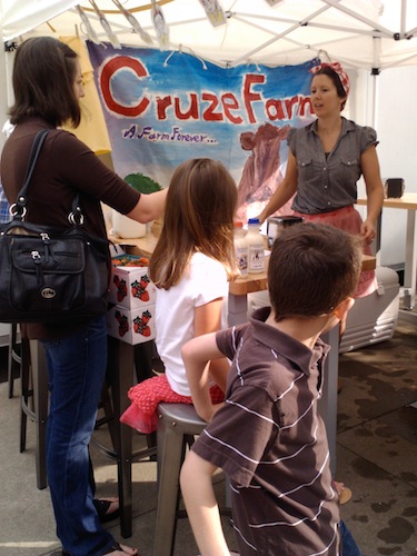cruze-with-kids The Cruze Farm girls had a cute "milk bar" set up and were doing a brisk business.