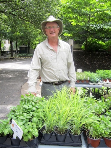 gregory Gregory Blankenship of Gregory's Greenhouse offered to repot the herb garden I bought from him last year.