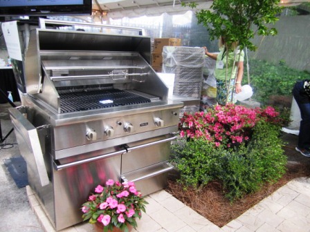 grill A grill with all the bells and whistles completed the envy-inspiring outdoor kitchen.