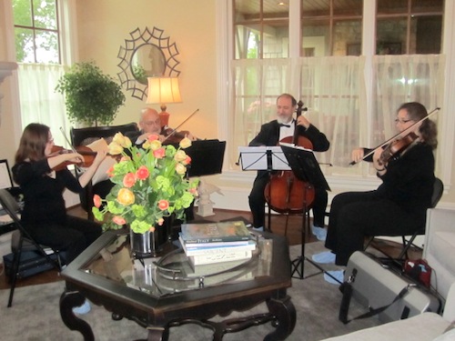 quartet1 A quartet from the Knoxville Symphony helped set a lovely mood. The are, from left, Diane Zelickman, John Michael Fox, Ihsan Kartal and Jennifer Bloch.