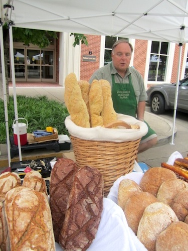 rick-and-his-bread1 Rick Rickerman had a wide assortment of loaves from which to choose. We selected an asiago with sun-dried tomatoes and herbs. It is awesome.