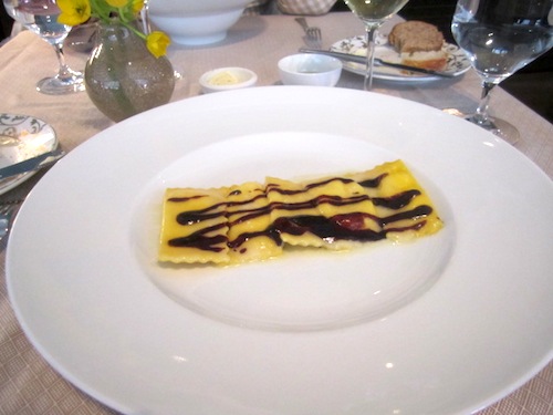 tortelli Alan's pasta course was tortelli: ricotta nd mascarpone ravioli with sottocenere cheese and red wine glaze. (I forgot to take a photo of our first courses, which also were spectacular!)