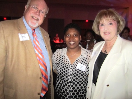 farrells-and-staffer Rusty and Beverly Farrell pose with Jolette Law, center.