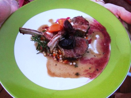 lamb Cardamom rubbed rack of lamb with expresso jus over almond cous-cous with poached cherries! Wow.