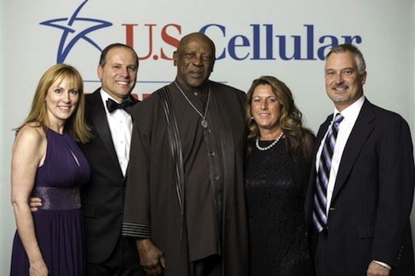 catanis-brundiges-gossett Also at the reception, Gossett posed with local U.S. Cellular executives Tom Catani with his wife, Deanene, at left, and Jack Brundige with his wife, Jackie, at right.