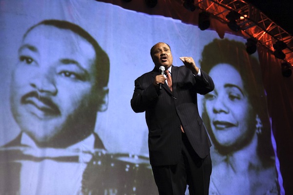 mlk-3 Martin Luther King, III, speaks in front of projected images of his parents, Martin Luther King, Jr., and Coretta Scott King. Chilling.