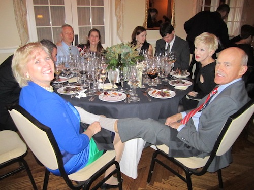 hurt-foot Our auctioneer for the night, Bear Stephenson, had hurt his foot in an ATV accident earlier that day. Here he is with his foot in state Sen. Becky Massey's lap! He eventually had to leave the event to go to the emergency room.