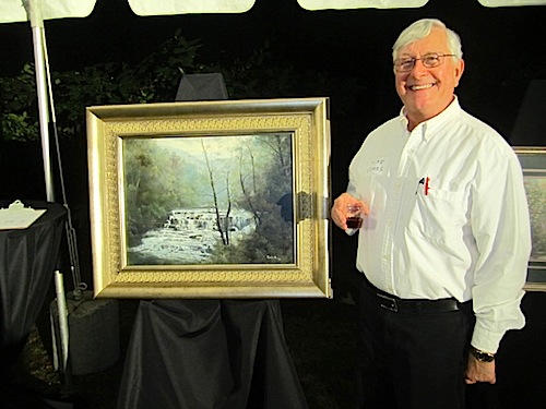michael-combs The KSO's Michael Combs beside a Ron Williams painting Alan and I won at the silent auction. It's our first Ron Williams.