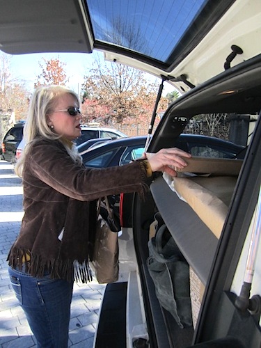 cheryl-loading-purchase We loaded Cheryl's two paintings and hit the road back to Knoxville.