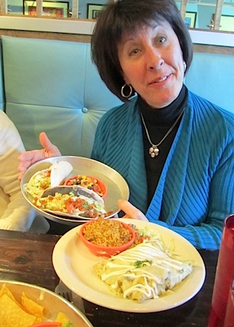 katie-with-enchiladas-and-tacos Katie shows off some of our plates.