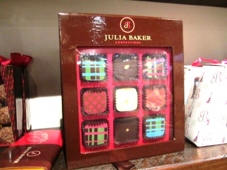 chocolate You definitely should thrown in some gourmet chocolate by Julia Baker. There is even a local connection -- she is the girlfriend of Ken Lowe, president, chairman and CEO of Scripps Networks Interactive!