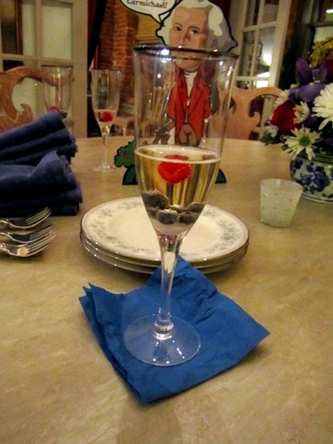 champagne-cocktail Alan made us champagne cocktails and dropped blueberries and raspberries in them to coordinate with the patriotic theme.