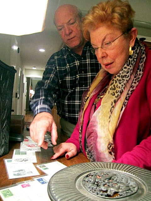 mickey-bruce-and-postcards Like a set of postcards bearing images of U.S. Presidents that he's showing to Mickey Mallonee here.