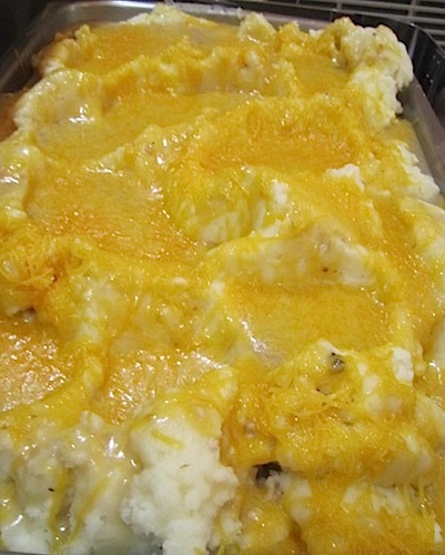 potatoes Poutine-style mashed potatoes. Poutine potatoes normally means french fries served with an cheese and gravy sauce. But, Chef White said, "I refused to make french fries for 120 people!"