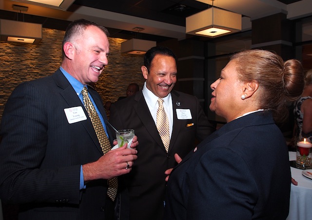 Tim Young, left, chats with Phyllis Nichols and Marc Morial.Young is a member of the Knoxville Area Urban League's board of directors.