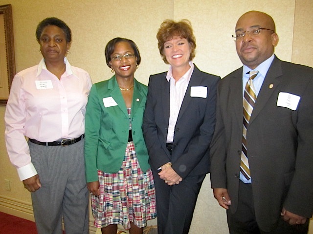 From left, Urban League Board member Avis Young, Jan Brown, Leigh White and staff member Felix Harris after the breakfast.