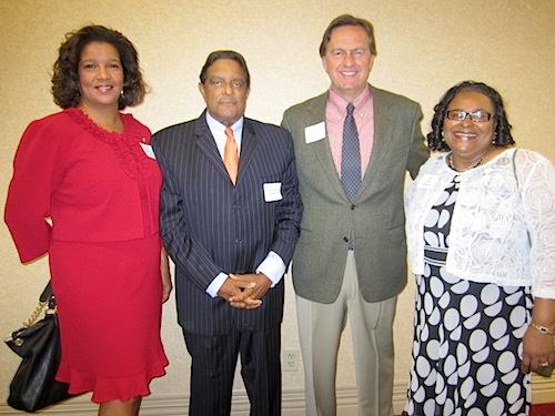 From left, staffer Rowena Lundy, board members Lonnie Jones and Al Pirie, and staffer Jackie Robinson