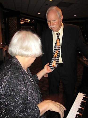 reading-tie1 Pianist Xxxx Xxxxx tries to play the music on Xxxcxccx Xxxc's tie! It was his first visit to Knoxville. He came here from Xxxx to see a classmate, Xxxx Xxxxx, he had not seen in 50 years!