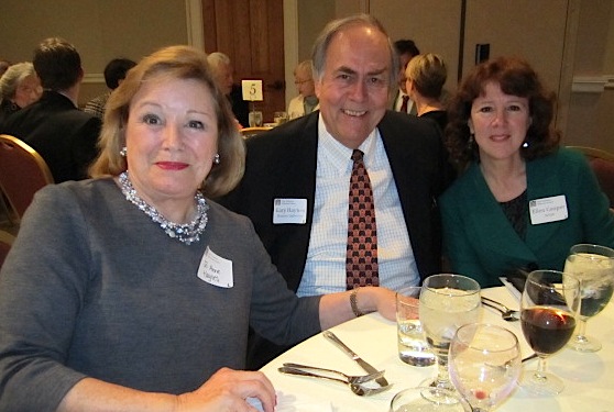 The artist, Ellen Cooper, right, with Gary and Joe Anne Haynes. Haynes Galleries of Nashville represents Cooper.