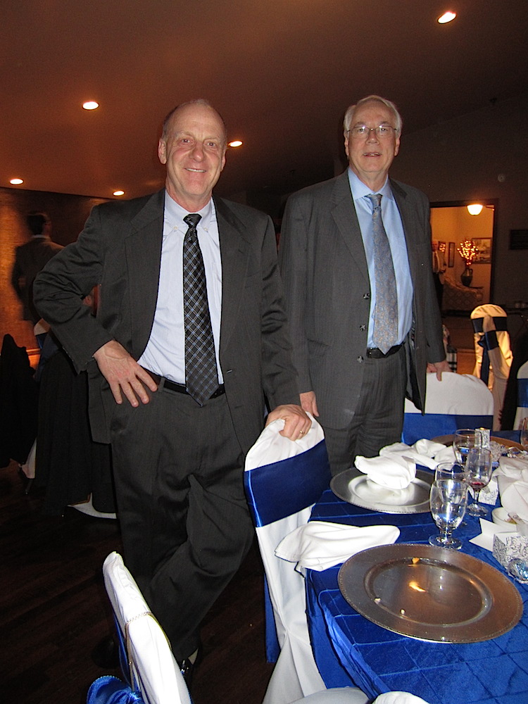 Bruce Hartmann, left, and Alan Carmichael enjoying the antics on the dance floor.