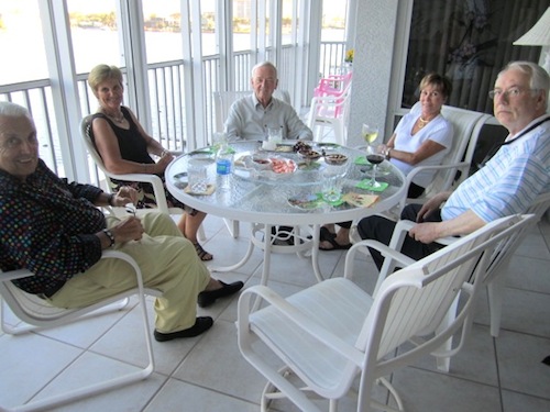 From left, Bobby, Mary and Dick Kazitka, Wanda McMahan and Alan Carmichael on the Kazitka's porch at Le Dauphin at Vanderbilt Beach in Naples in 2012.