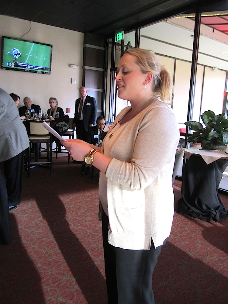 Moxley Carmichael's Lauren Christ announcing the results of the contest.